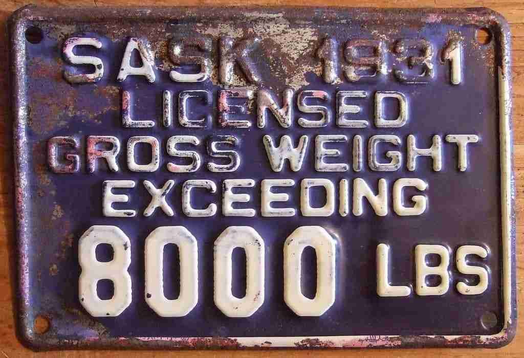 8000 Personal Loan With Bad Credit An aged and weathered 1931 Saskatchewan vehicle license plate indicating "licensed gross weight exceeding personal loan with bad credit lbs.