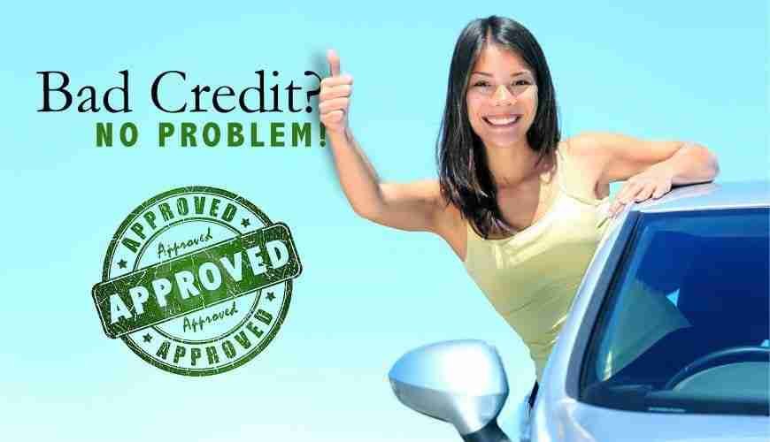Leased Finance and Loans girl leaning out of car window thumbs up