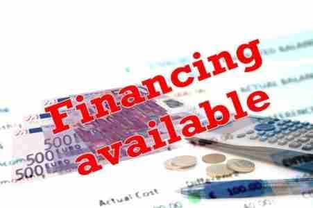 Capital Money Loans finance available printed on top of cash