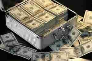 1200 Fast Cash in a metal suitcase